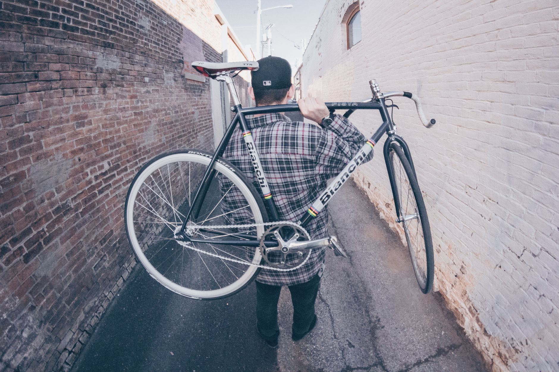 Fixed-gear riders at street level